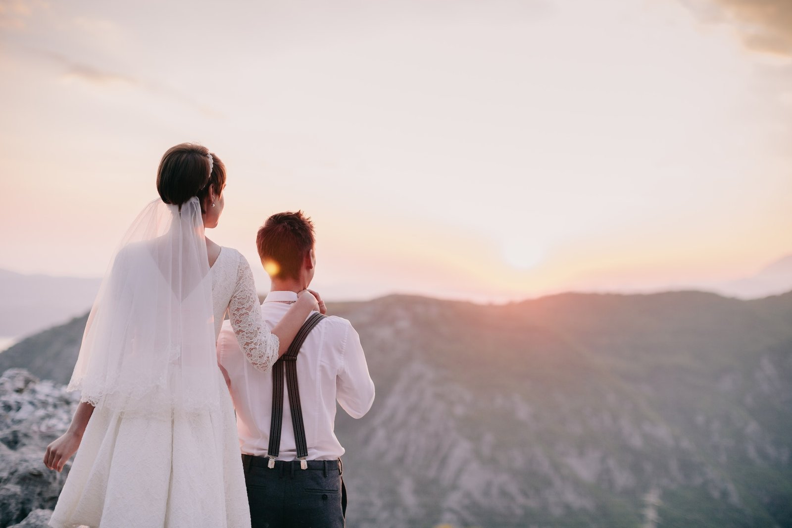 honeymoon wedding couple travel at sunset